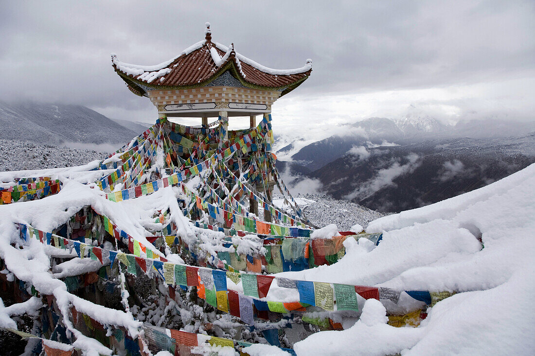 Fresh snow at the vista point east of Deqin, Yunnan Province, China.
