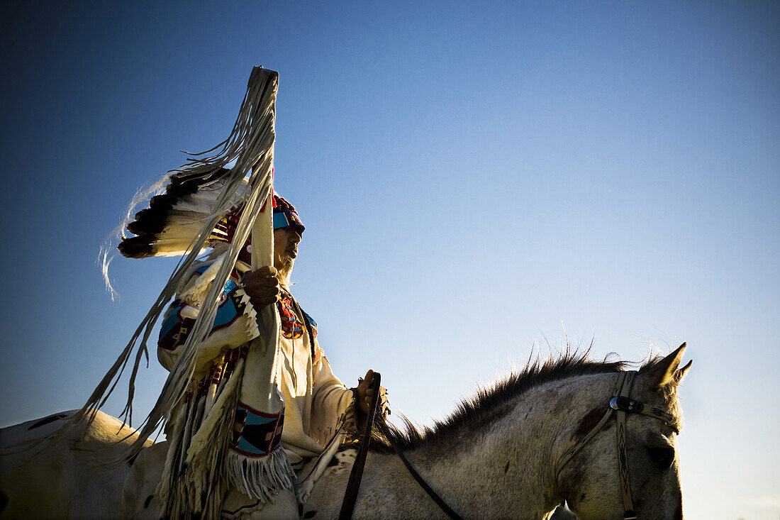 A Native American man rides a horse at the Julyamsh Powow in Post Falls, Idaho.