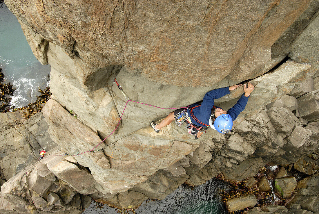 Dana Ikeda lead climbing The Moai, Tasmania, Australia