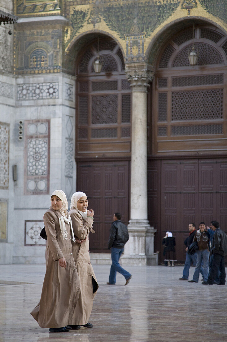 Damascus, Syria - January 2008: Umayyad mosque in Damascus has been for 3000 years a place of worship starting with an Aramaens temple to the god Hadad - over the years Jupiter with the Romans, then Christ and lastly in 636 AD Muslims entered Damascus. It