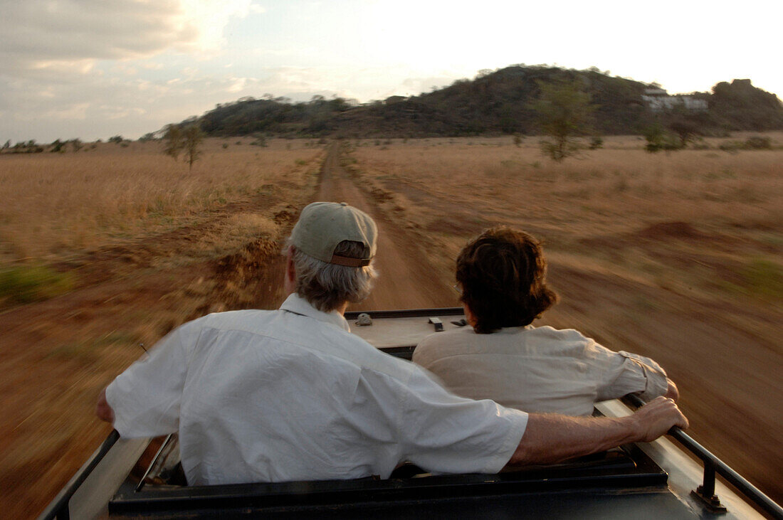 John and Laurie McBride take in the view on a game drive in Kidepo National Park in northern Uganda.