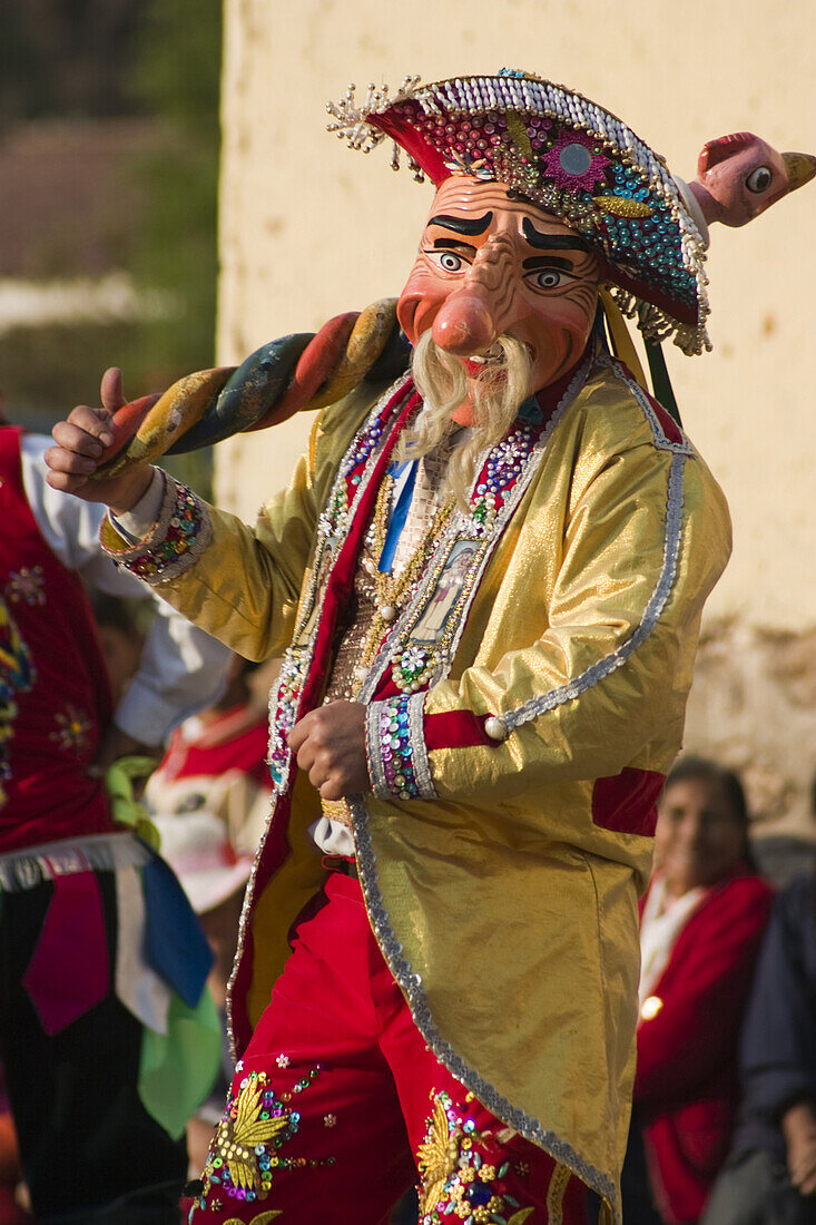 A masked dancer performs in a dance competition held in Llamay, Sacred Valley, Peru on September 1, 2005. The festival is held in honor of Santa Rosa de Lima, South America's first catholic saint.