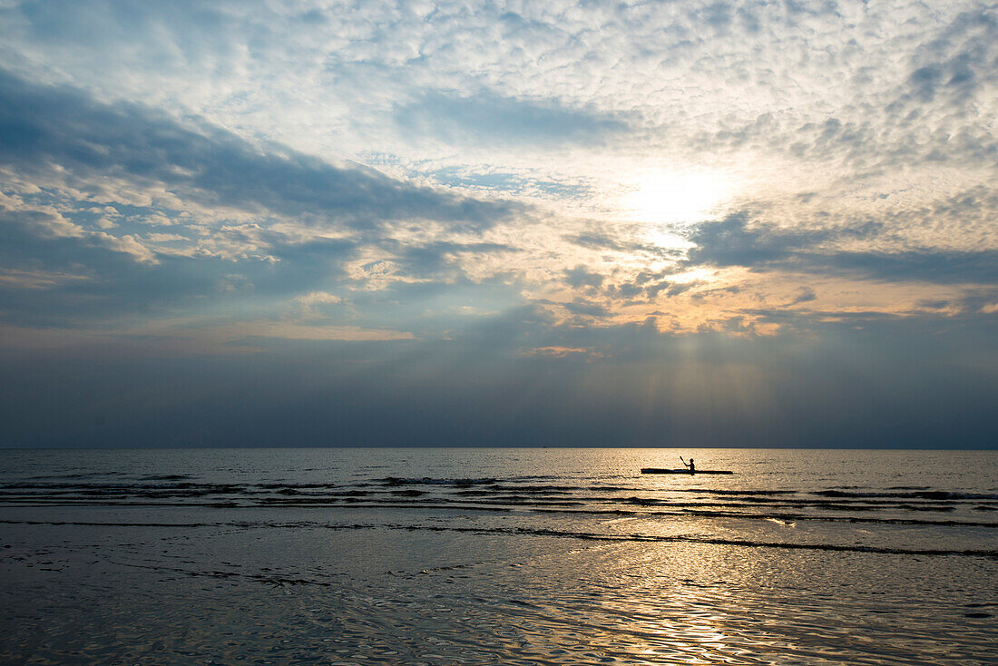 Freya Hoffmeister paddling in front of St-Peter-Ording, North sea, Germany