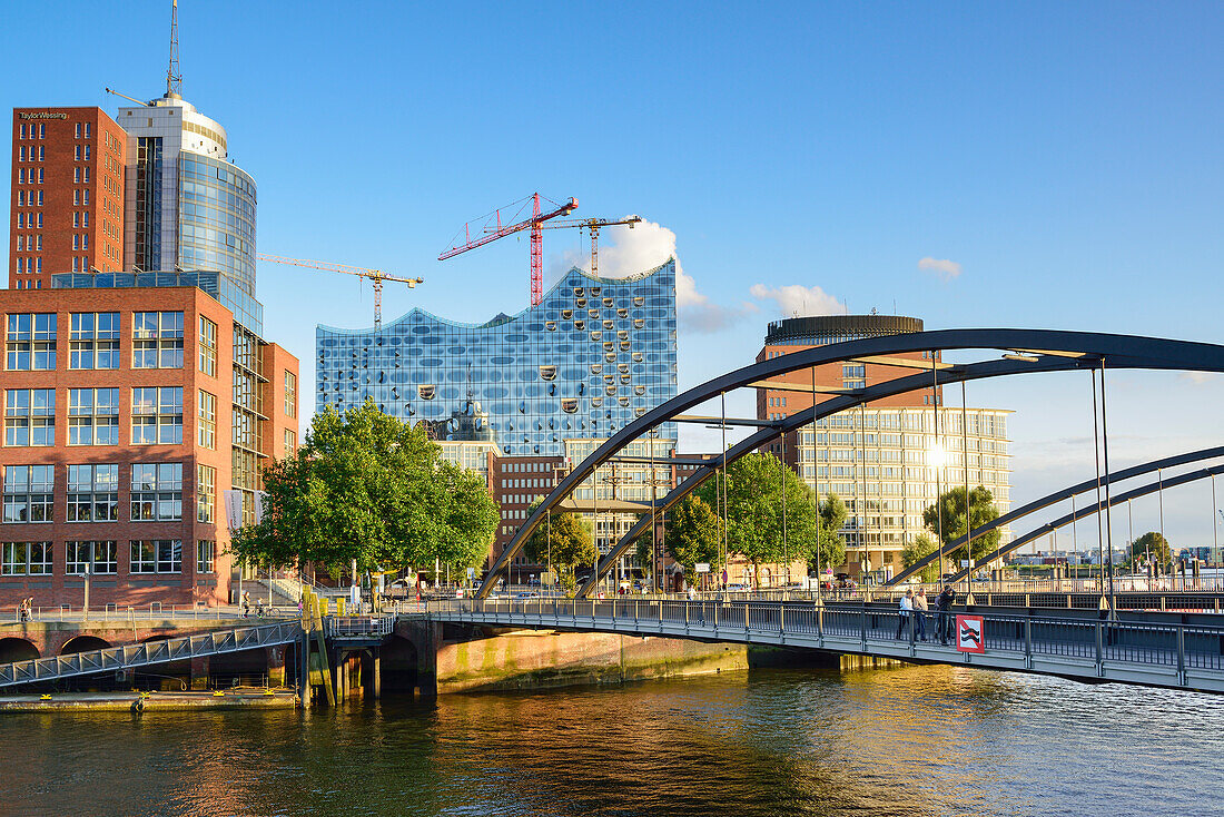 Bridge Niederbaumbruecke with Elbphilharmonie in the background, Warehouse district, Speicherstadt, Hamburg, Germany
