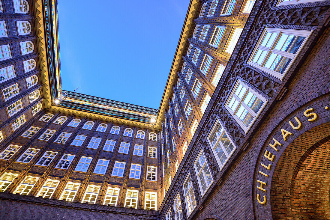 Illuminated atrium of Chilehaus, Chilehaus, Kontorhausviertel, Hamburg, Germany