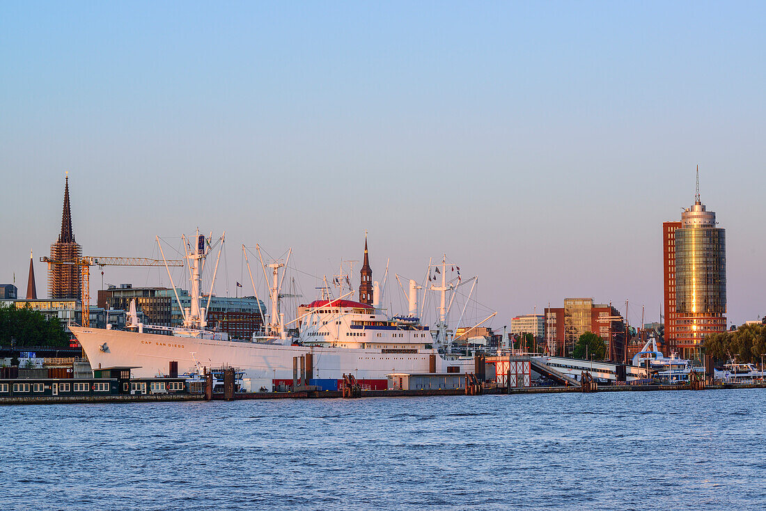 River Elbe with view to church of St. Nicolai, church of St. Katharinen, museum ship Cap San Diego and Hanseatic Trade Center, Hamburg, Germany