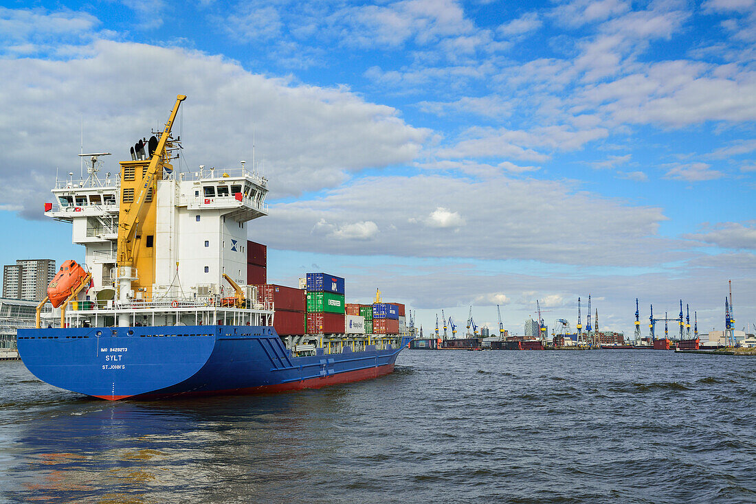Container ships on the river Elbe towards harbour of Hamburg, river Elbe, Hamburg, Germany