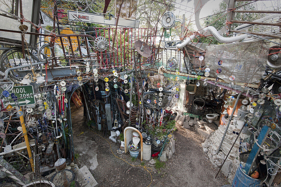 The main cathedral in the Cathedral of Junk, a yard art installation of junk in Austin, TX. Once considered a symbol of weird Austin, the structure was dismantled after 20 years due to pressure from city codes.