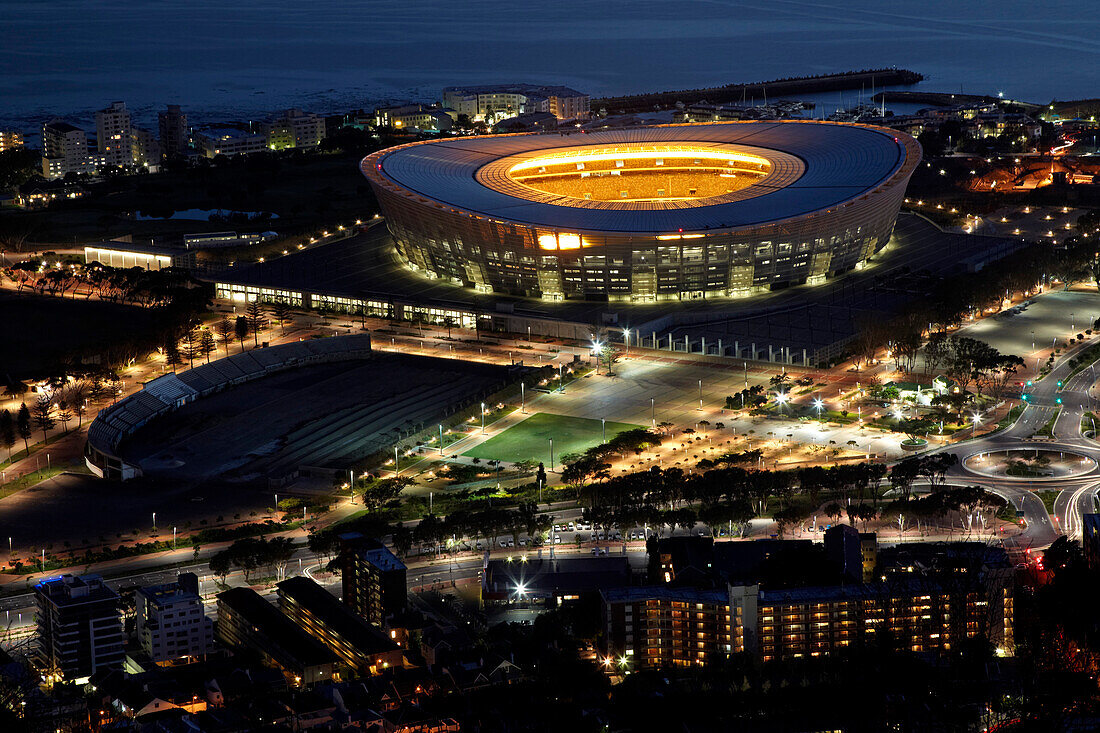 A view of Green Point Stadium in Cape Town from Signal Hill just before sunrise. South Africa.