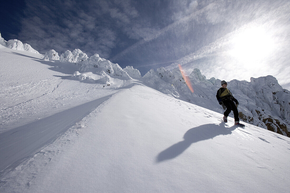 Mike Hauty makes his way down from the summit of Mount Hood.