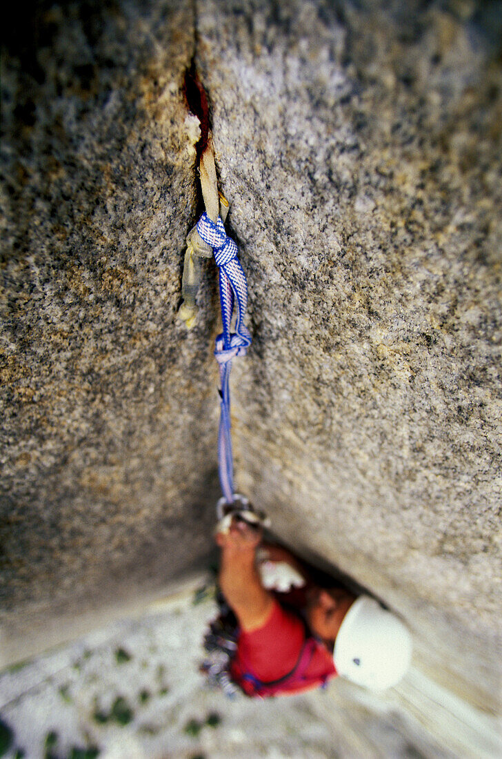 Rock climber Bob Porter makes his way up Zodiac, a 16 pitch 5.11 A3+ aid route on El Capitan in Yosemite National Park, California.
