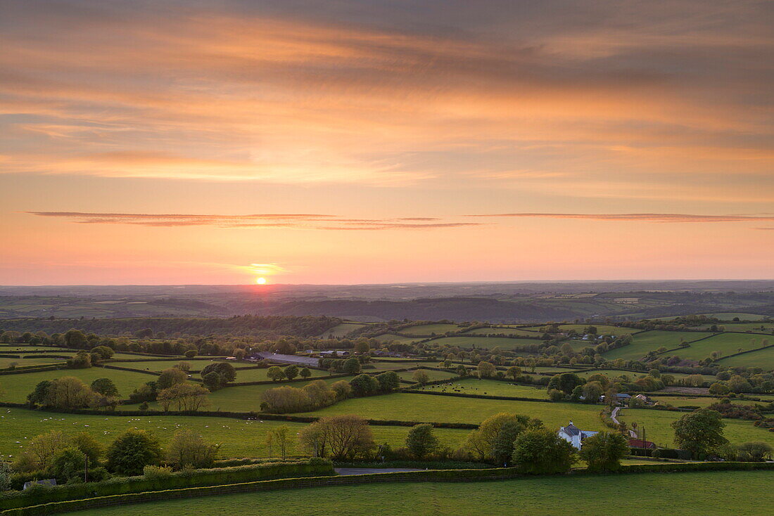 Sunset over beautiful rolling Devon countryside in summer, Devon, England, United Kingdom, Europe