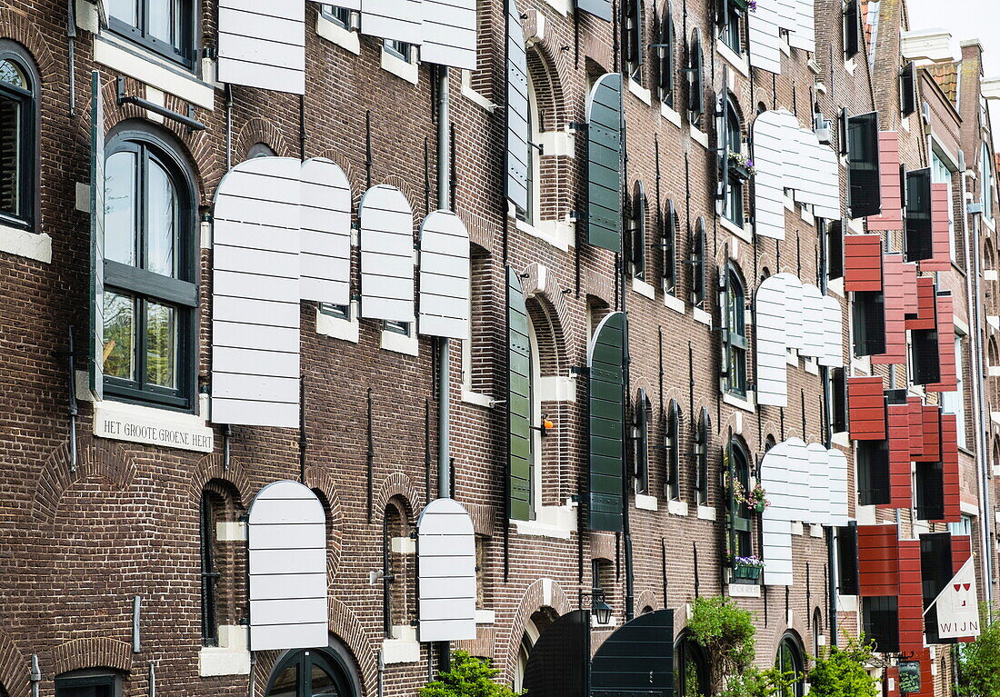 Old canal warehouses converted to houses, Amsterdam, Netherlands, Europe