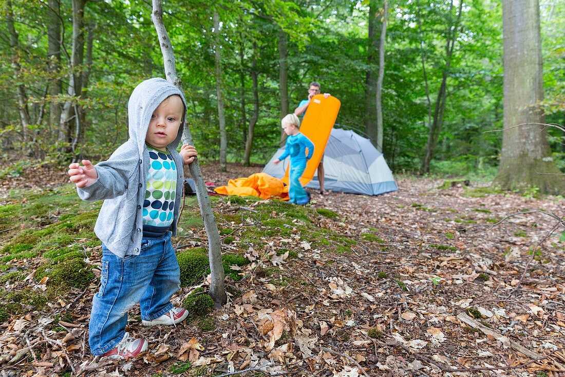 Family camping in a forest, Naesgaard, Falster, Denmark
