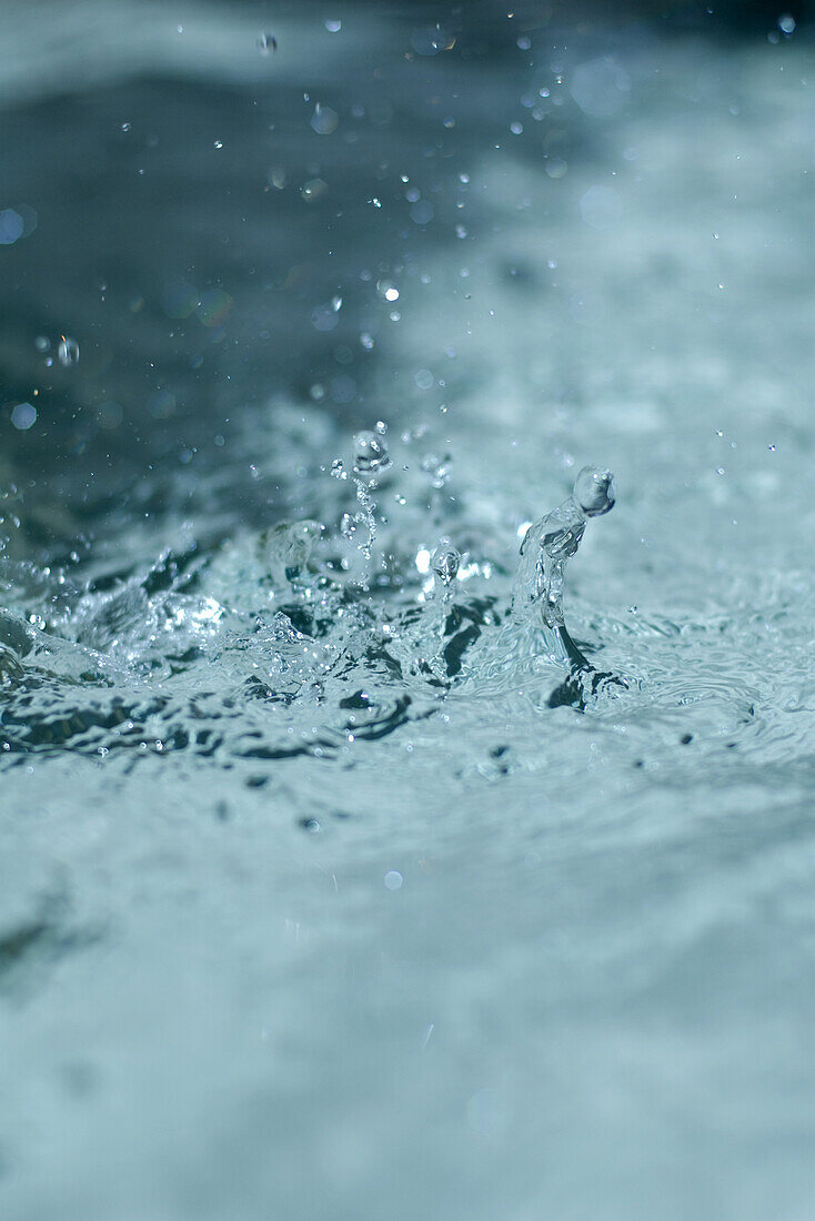 Water splashing, extreme close-up