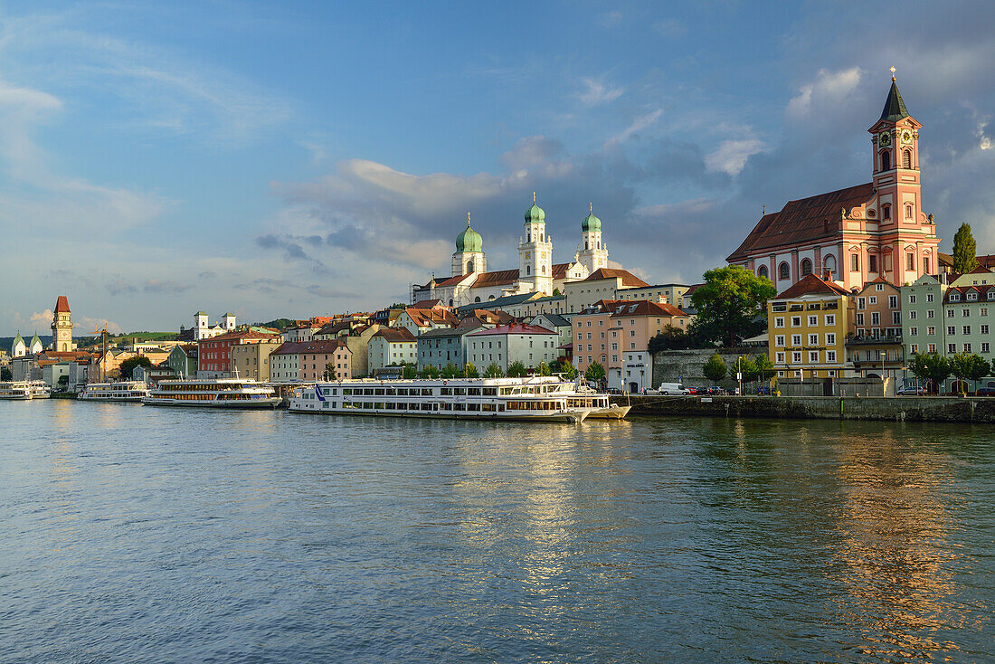 View over Danube river to old town with church of St. Paul and St. Stephans Cathedral, Passau, Lower Bavaria, Germany