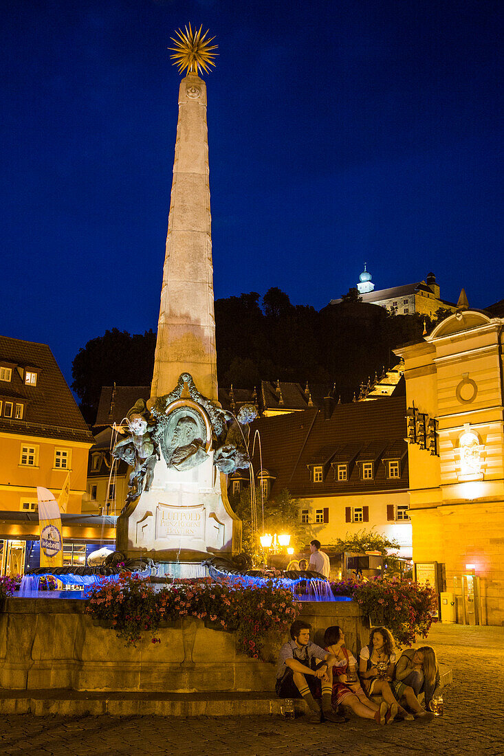 Luitpold fountain on the market square at night, Kulmbach, Franconia, Bavaria, Germany
