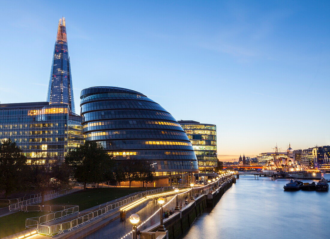 London skyline at dusk including the GLC building, HMS Belfast and the Shard, taken from Tower Bridge, London, England, United Kingdom, Europe