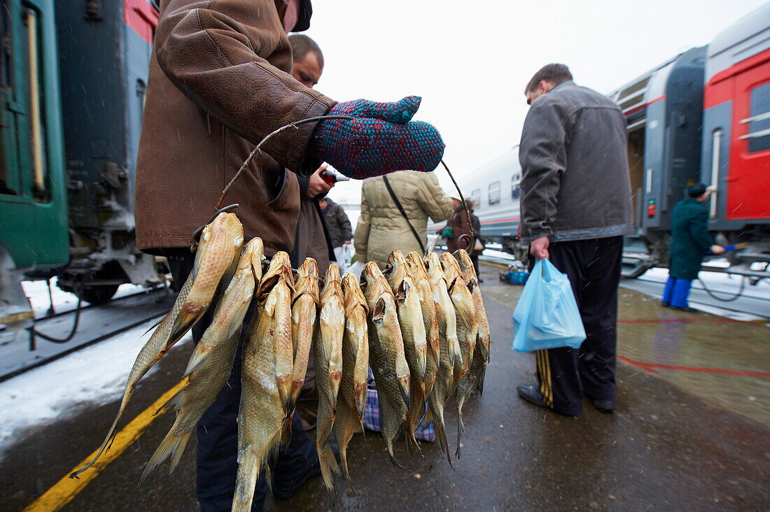 Fish seller at Balezino, 23 minutes stop at the railway station on the Trans-Siberian line, Udmurtia, Russia, Europe