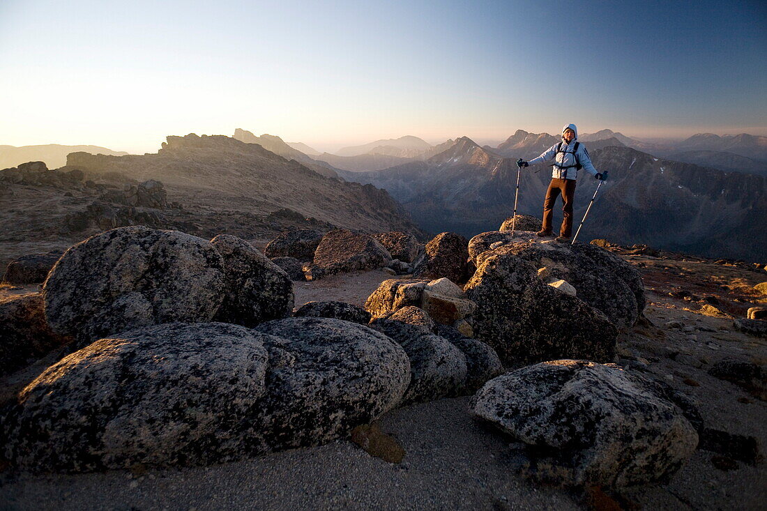 Hiker at sunrise, Cathedral Provincial Park, British Columbia, Canada, North America