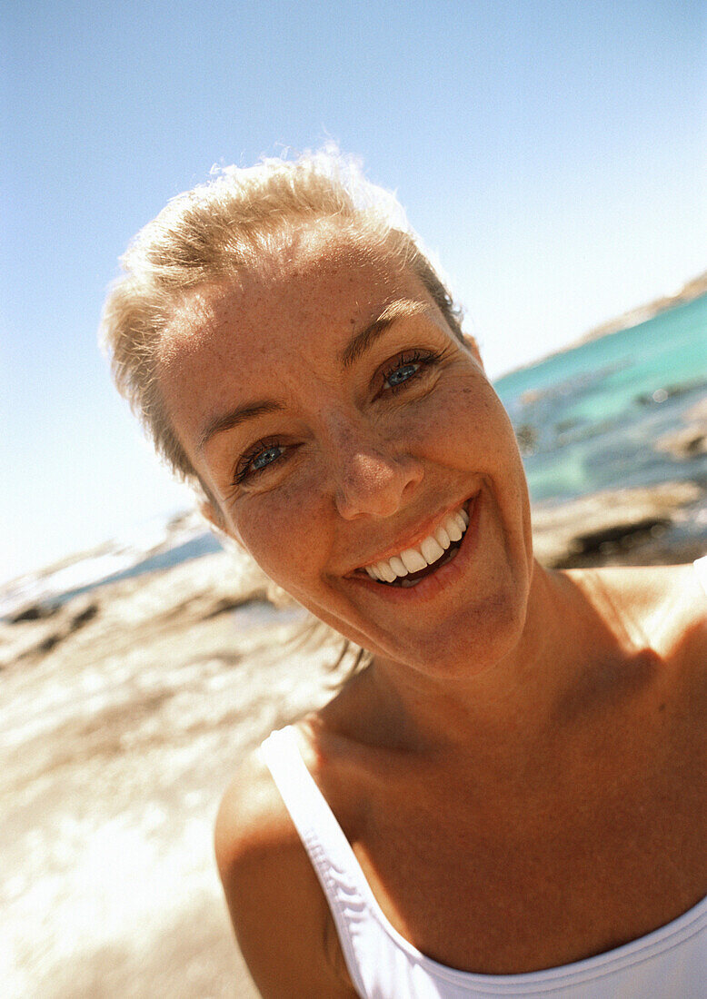 Close-up of woman at the beach.