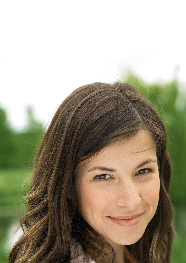 Young woman smiling, portrait