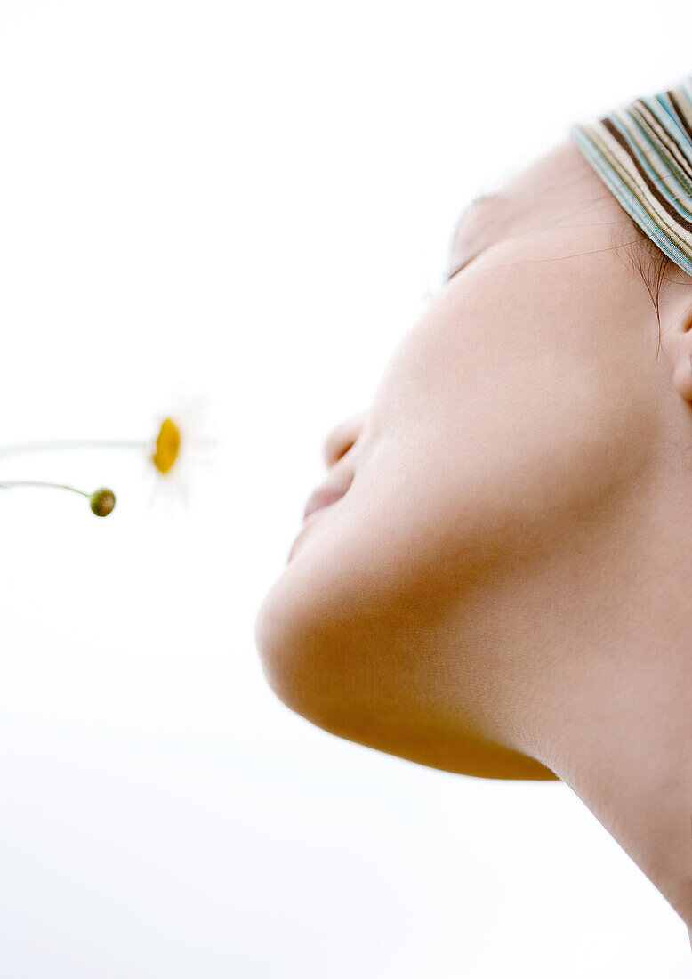 Woman's face and flowers