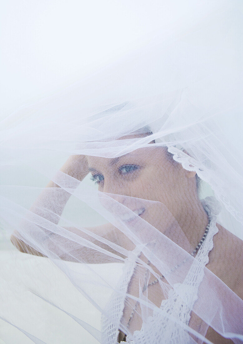 Bride, veil flying in wind
