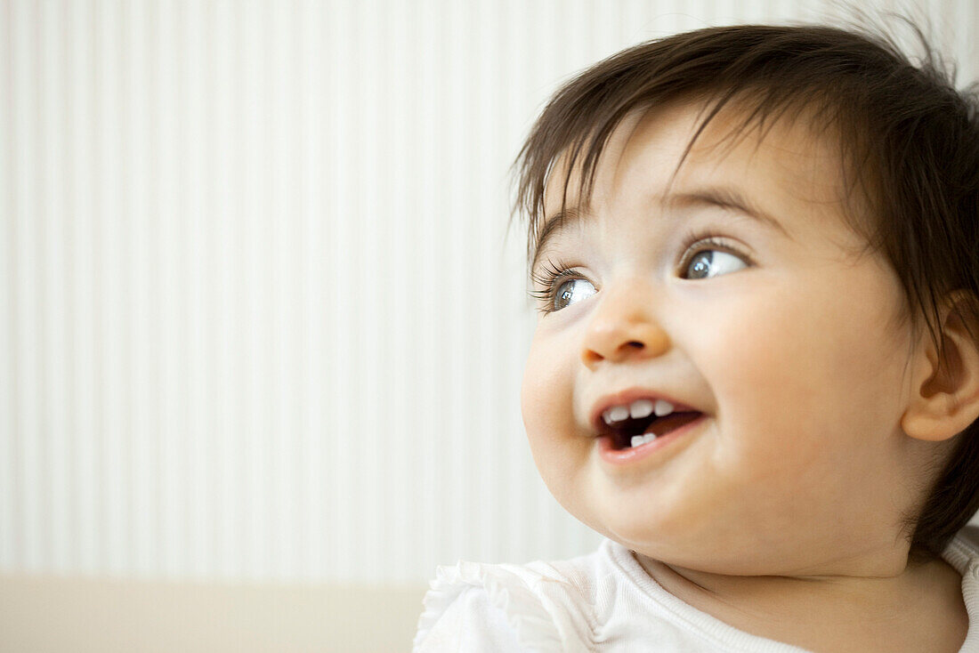 Baby girl smiling, portrait