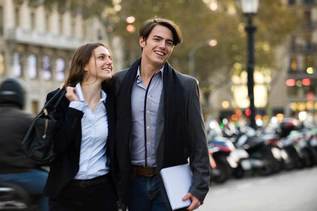 Couple crossing street together