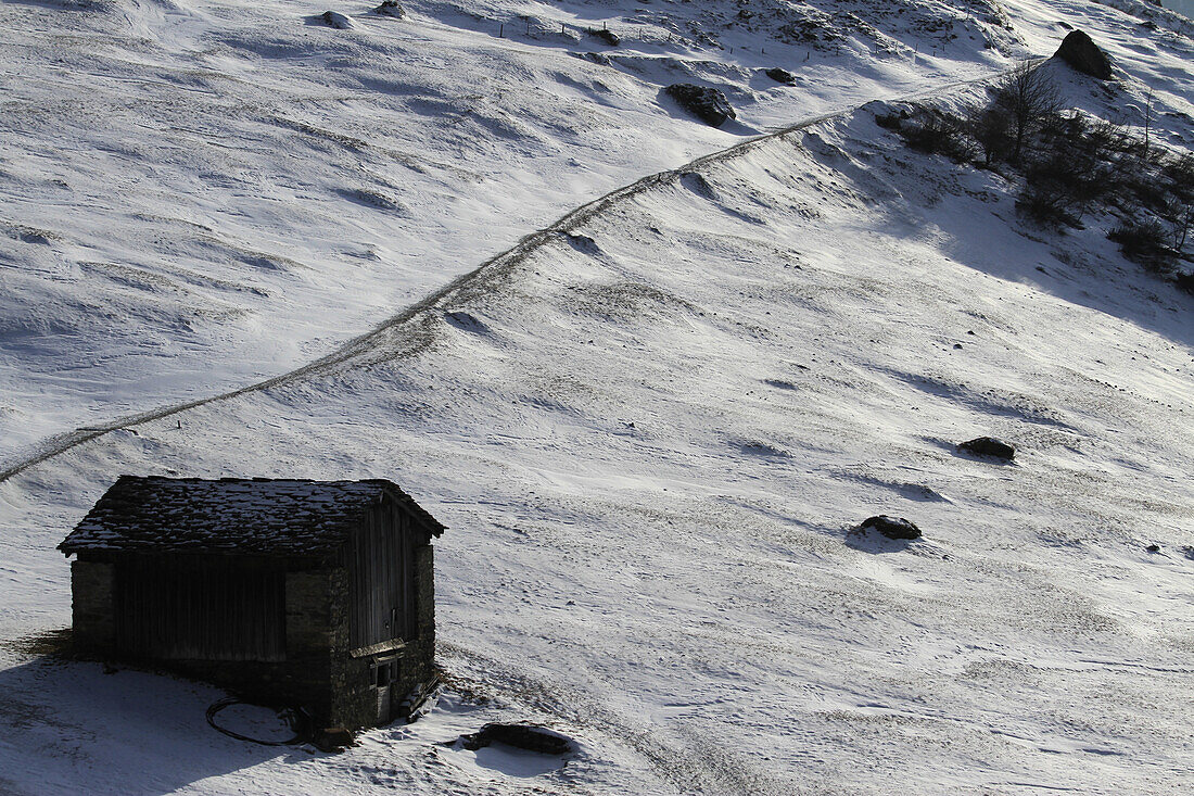 A remote wooden mountain hut, Graubunden Canton, Switzerland