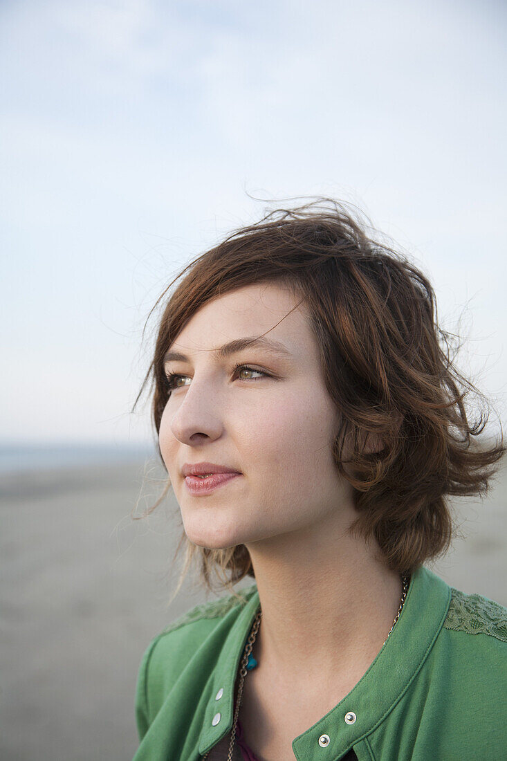 A young woman looking away, portrait