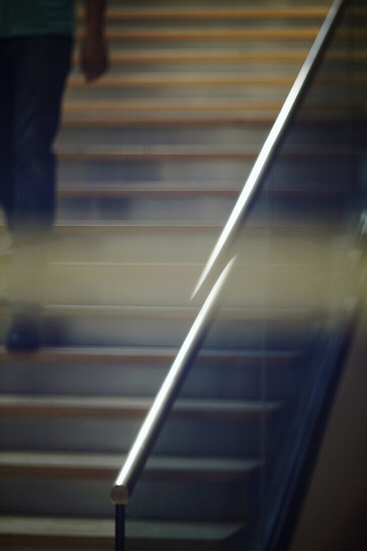 Man walking down stairs