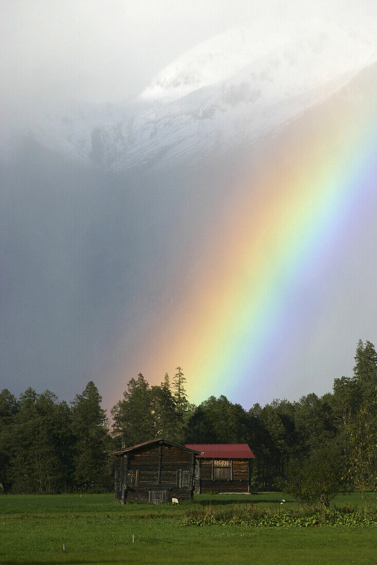 A mountain hut and rainbow, Rhone Glacier, Valais Canton, Switzerland