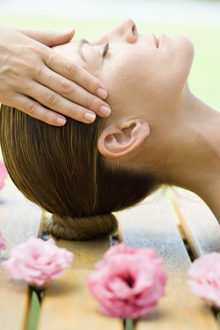 Woman having head massage