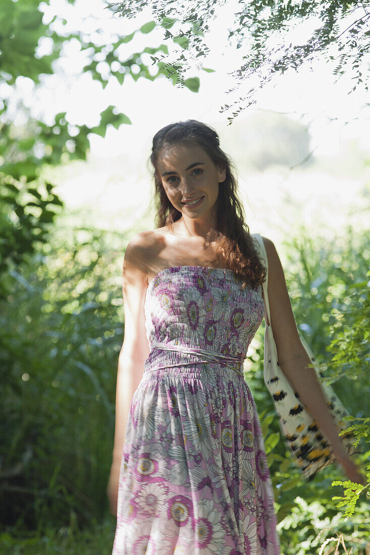 Young woman in woods, portrait