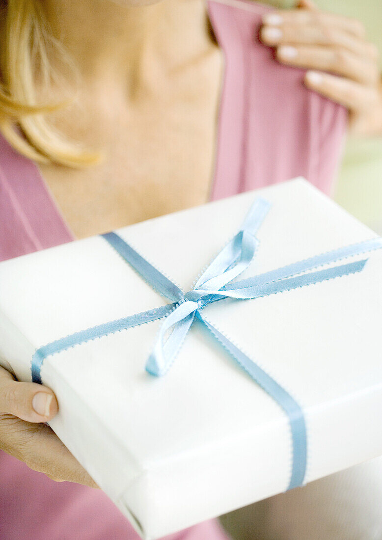 Woman holding present