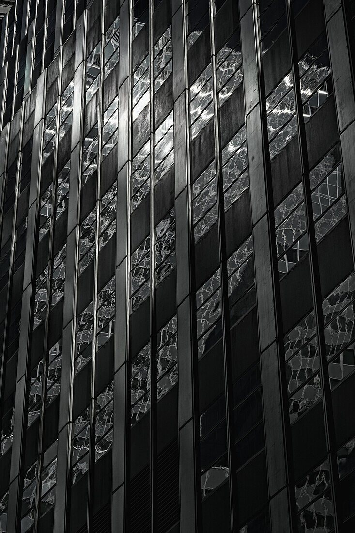 Bent reflections in skyscraper facade