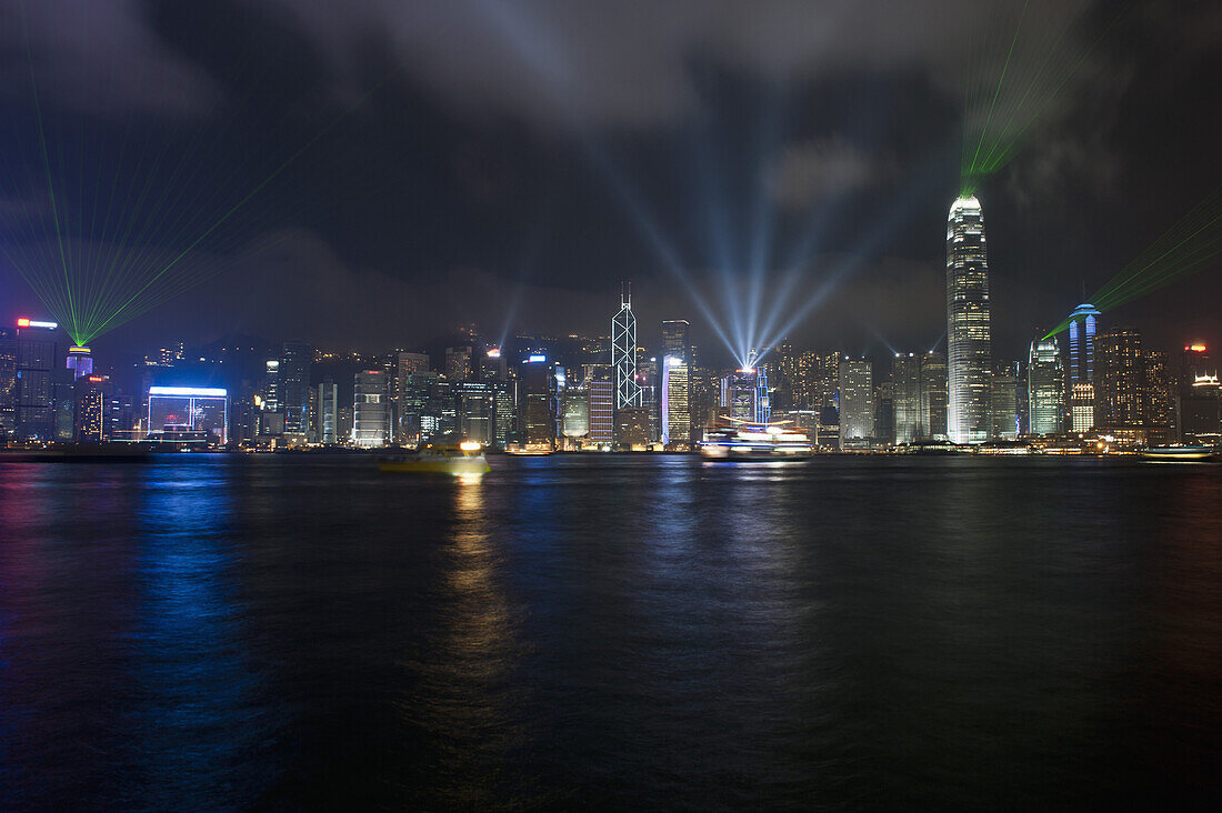 China, Hong Kong, Cityscape across water at night