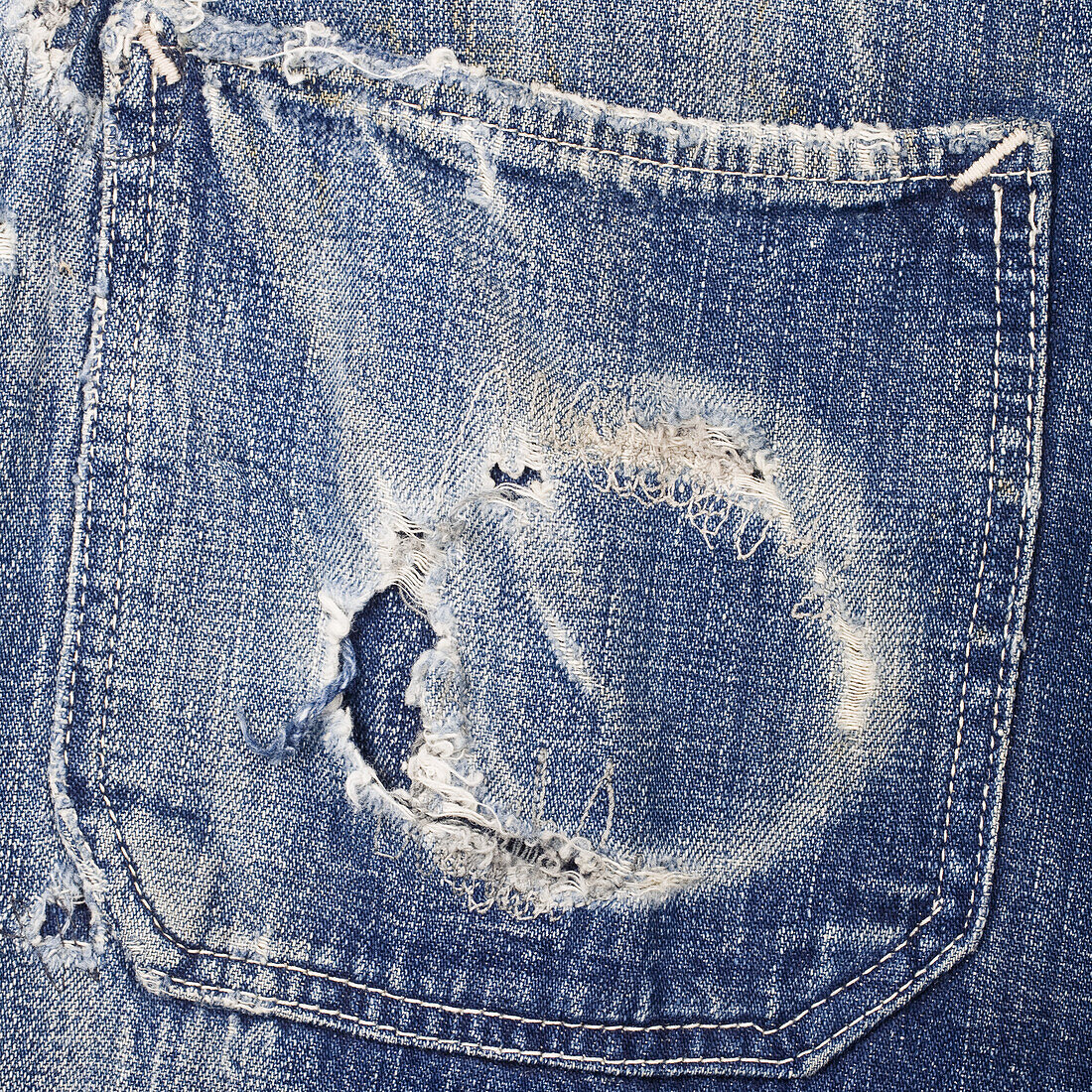 Worn out jean pocket