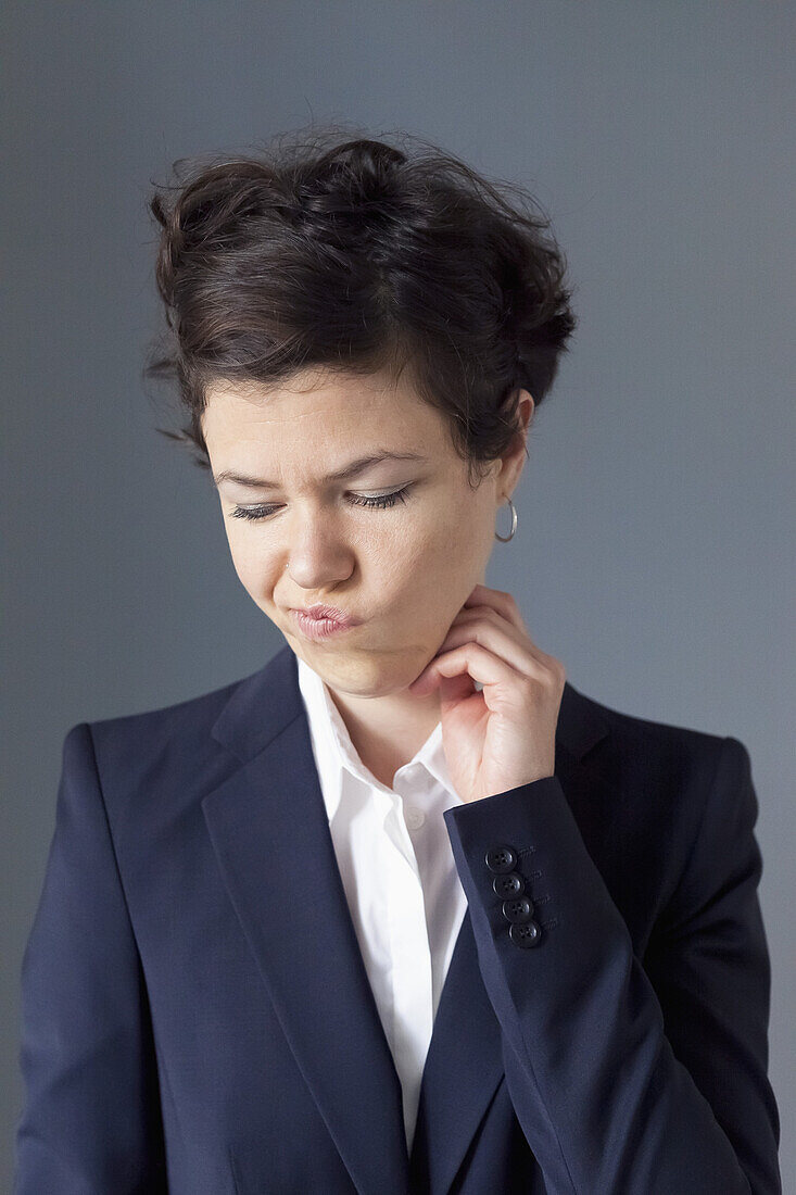 Mid adult woman making funny face, close-up