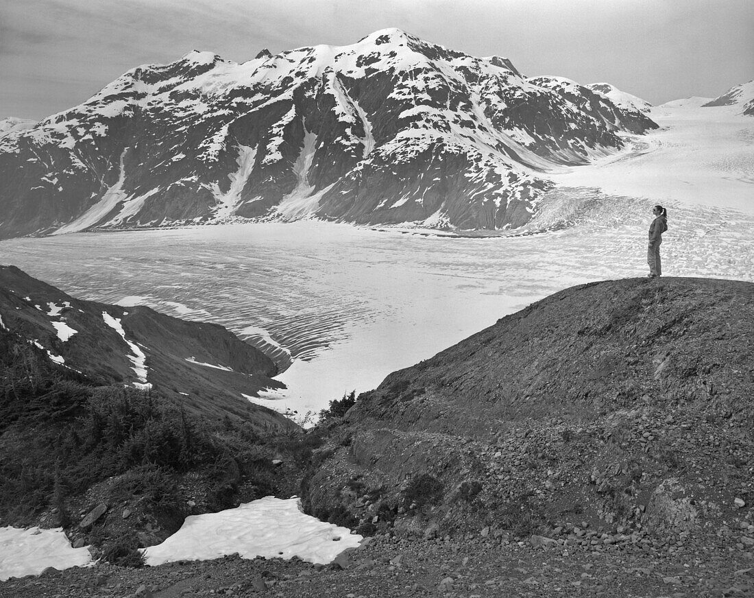 Woman looking at view at Leduc Glacier, British Columbia, Canada