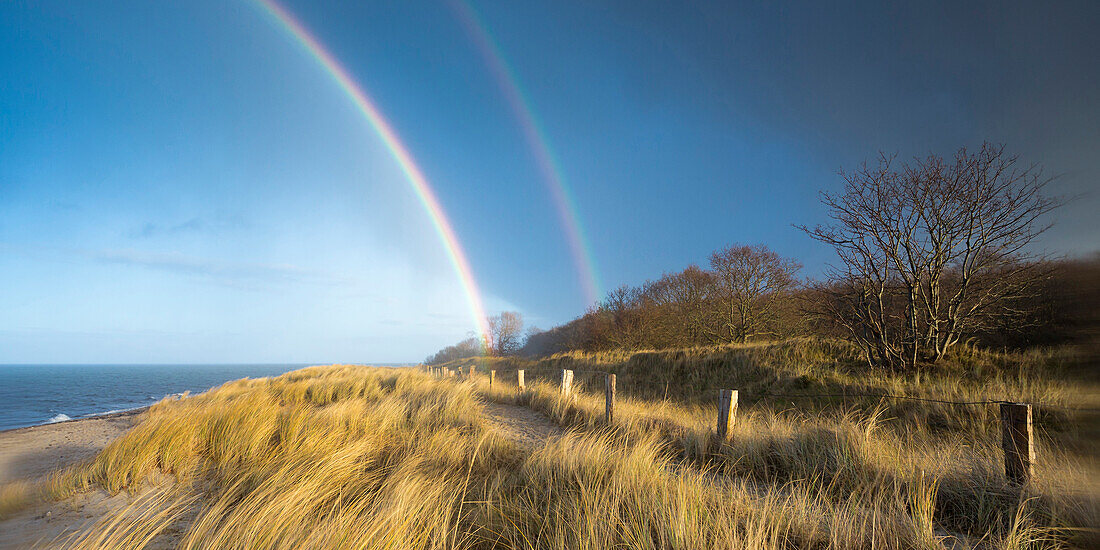 Beach and rainbow at Eckernfoerder Bay, Noer, Rendsburg-Eckernfoerde, Schleswig-holstein, Germany