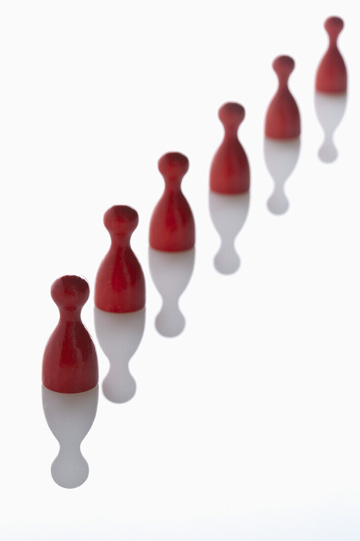 Red game pieces in a row