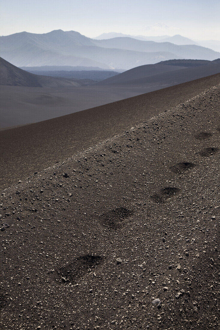 Trail of footprints along Lonquimay Volcano, Patagonia, Chile