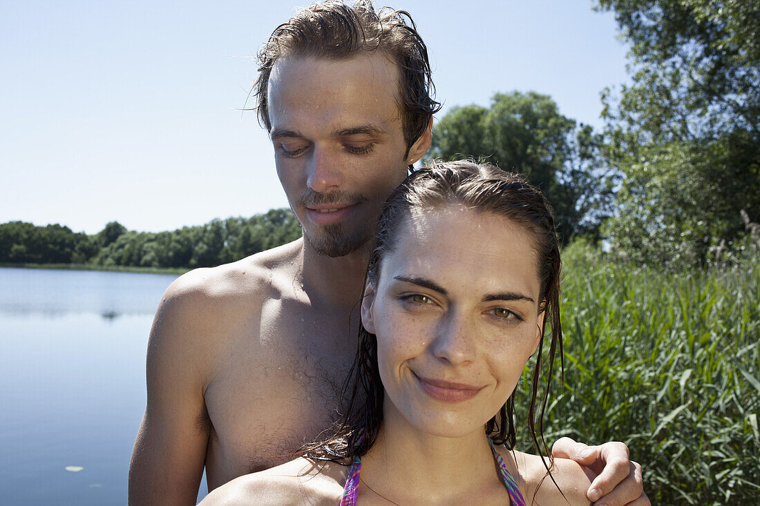 Boyfriend and girlfriend by the lake