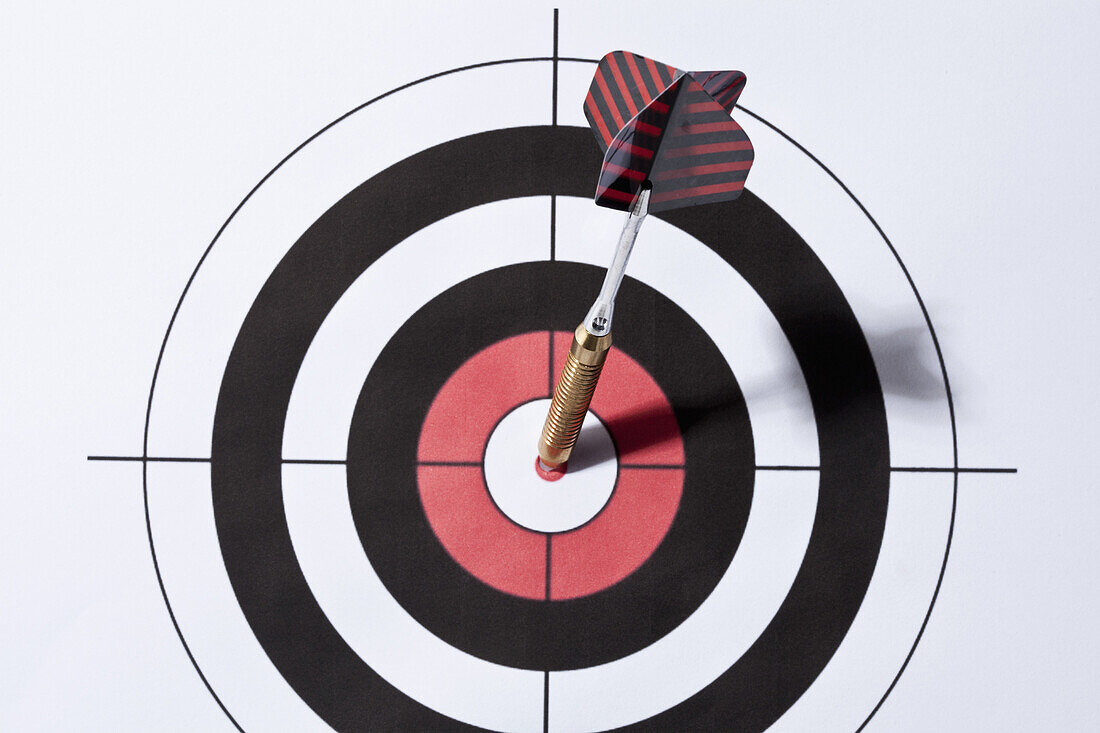 A dart in the bull's eye of a target