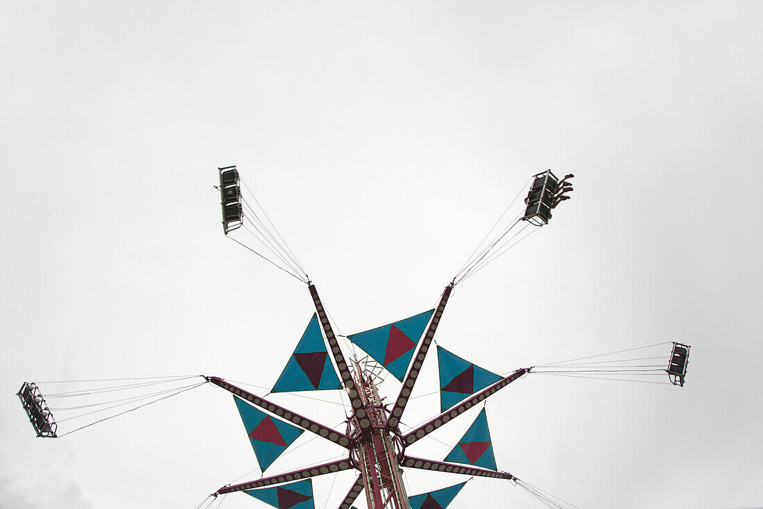 Low angle view of a fairground swing ride