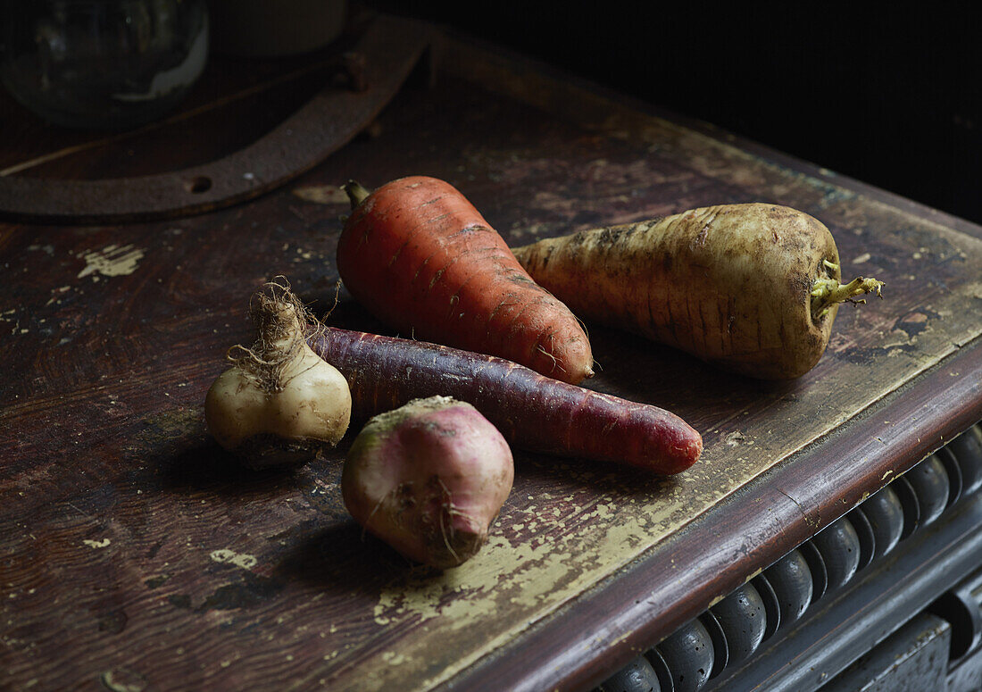 Root vegetables on wooden table