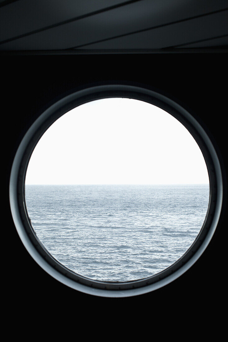 View of the sea through a porthole